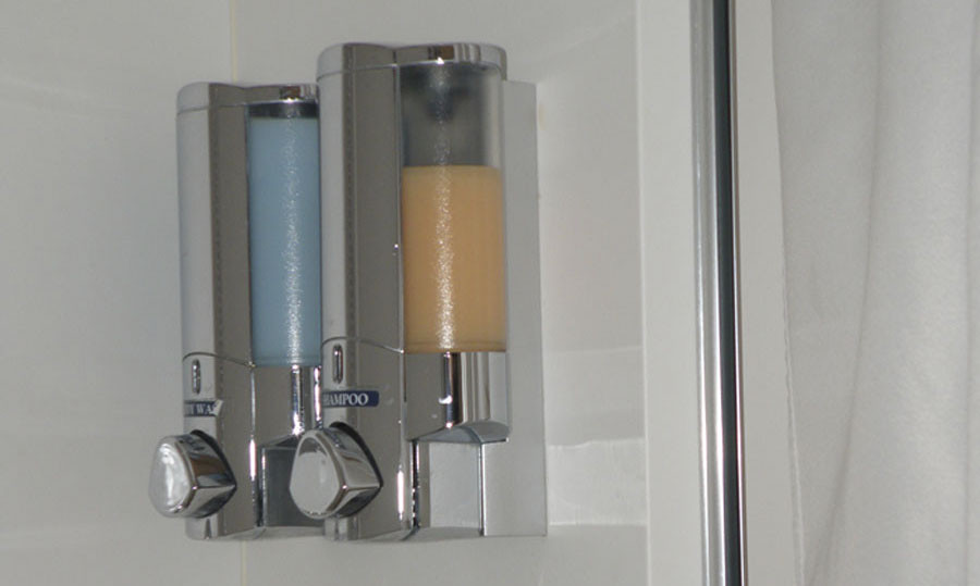 Dispensers containing hypoallergenic shampoo and shower gel on MSC Splendida