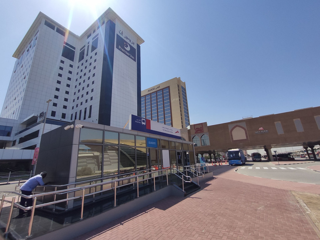 The right bus stop of shuttles going to the airport is located in front of Premier Inn Dubai Ibn Battuta Mall Hotel