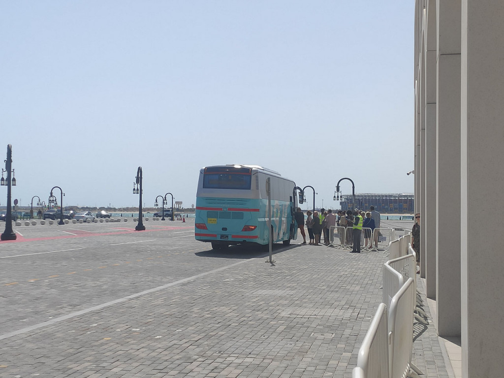 Shuttle buses stop in the port of Doha